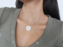 Silver weight plate pendant on silver chain